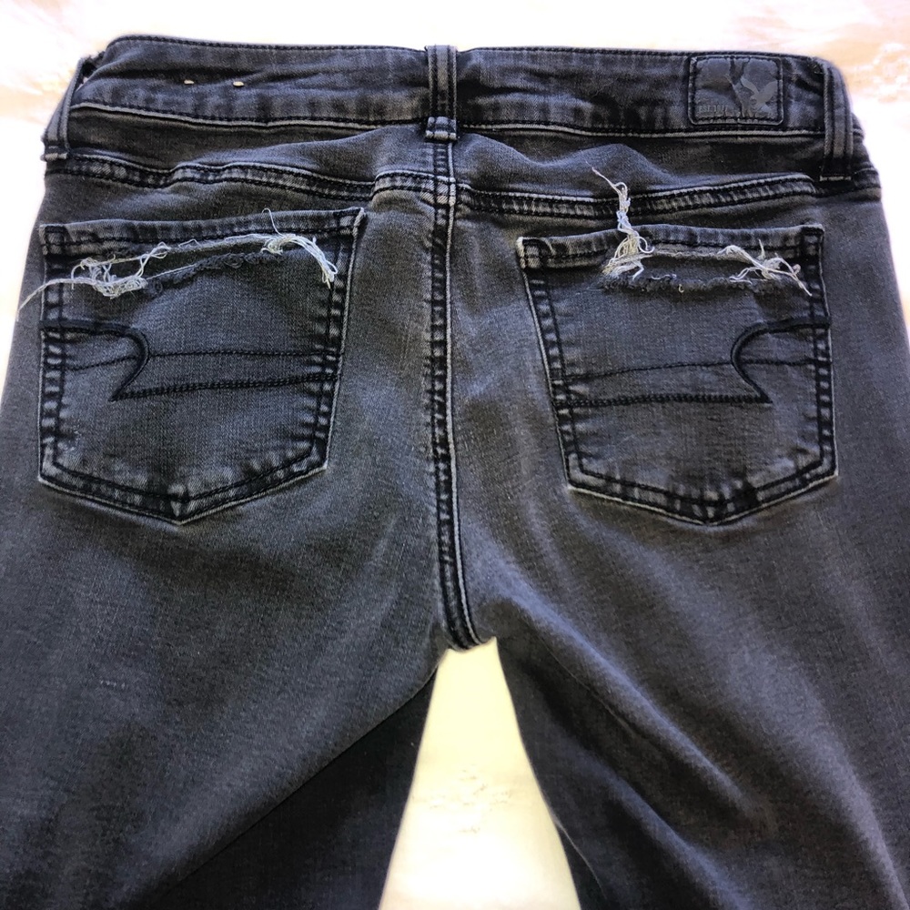 Black, ripped, stretchy jeans